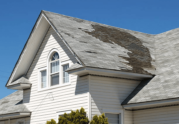 Hail-damaged shingle roof before restoration, Ottumwa Iowa
