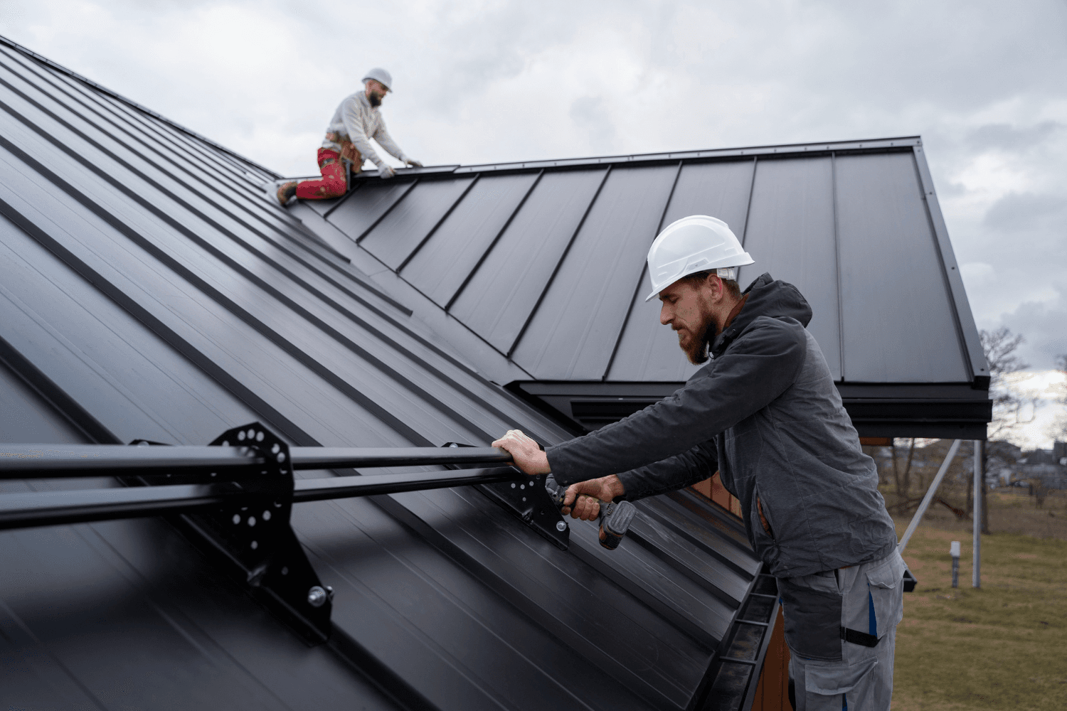 Professional roof inspection on metal roof