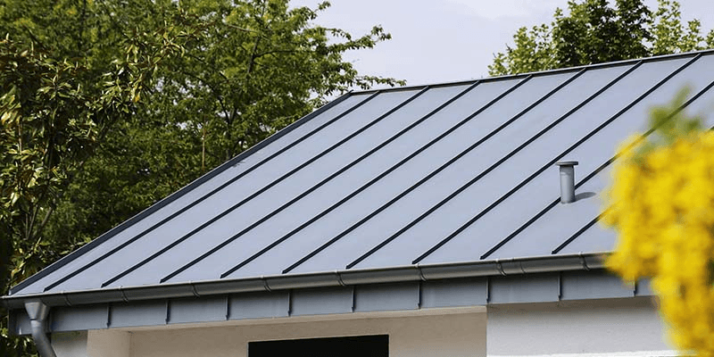 Metal roof ridge cap and gable detail