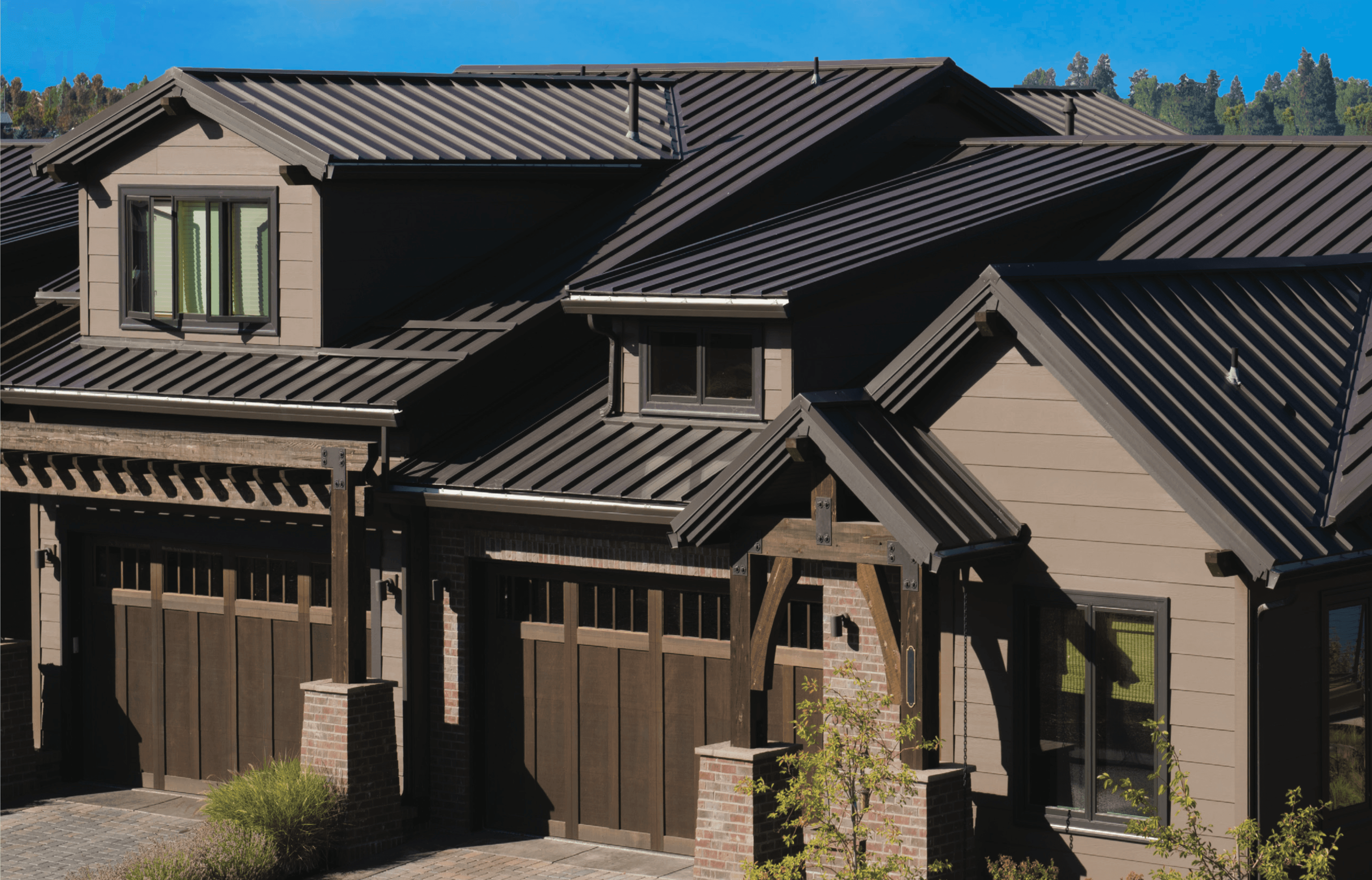 Kingdom Koatings metal roof installation on Midwestern farmhouse